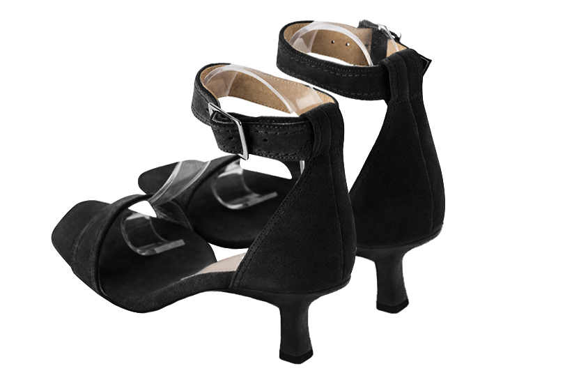 Matt black women's closed back sandals, with a strap around the ankle. Square toe. Medium spool heels. Rear view - Florence KOOIJMAN
